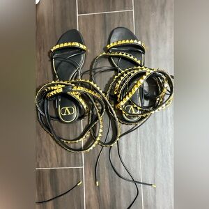Valentino Garavani Black and Gold Strappy Sandals